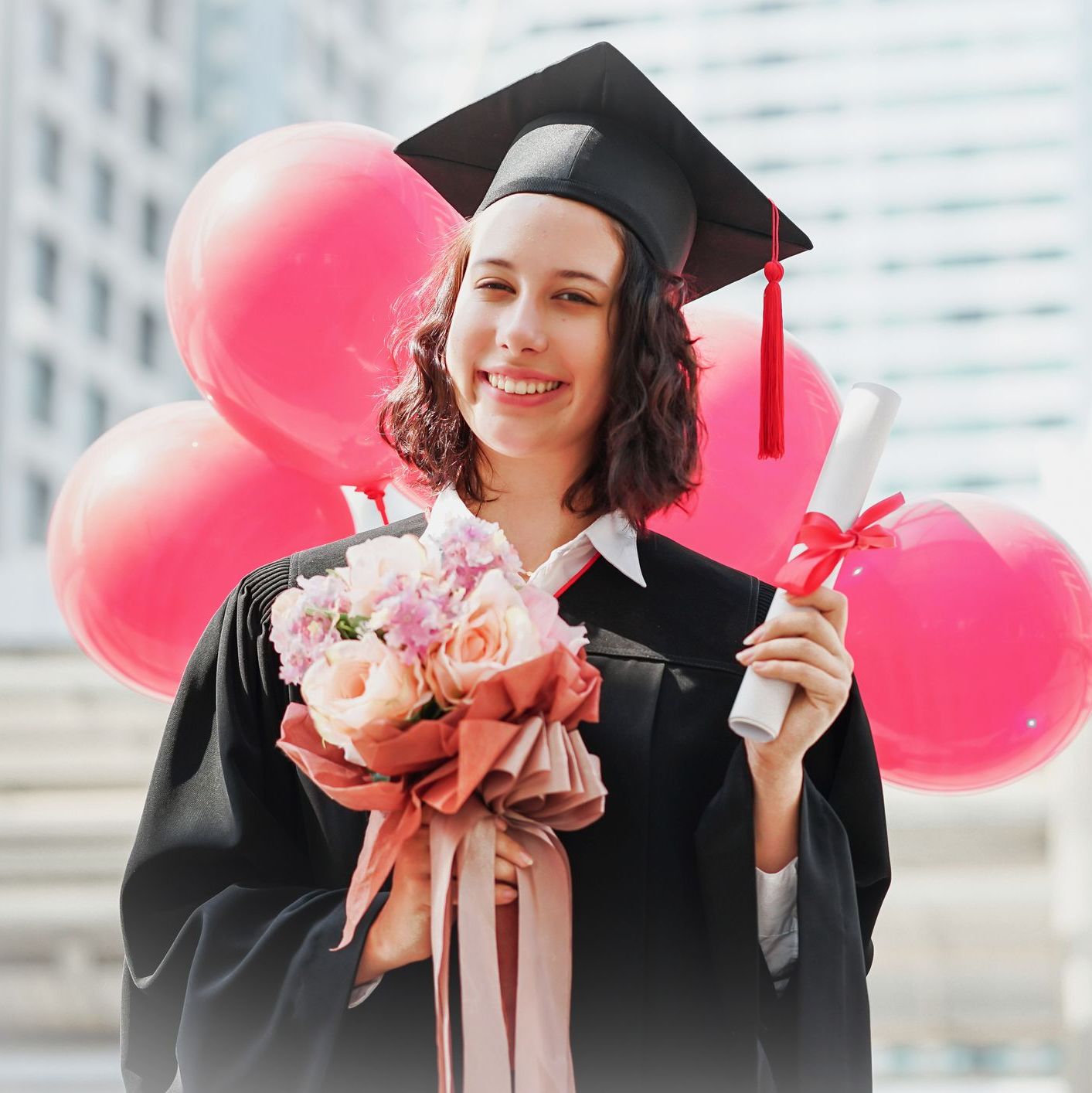 graduation day girl hold diploma and balloon congratulations on the graduation day.